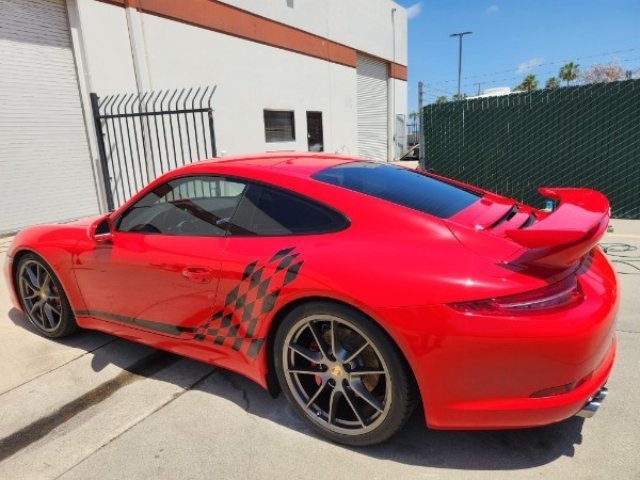Before exterior detailing on red Porsche in Orange County CA